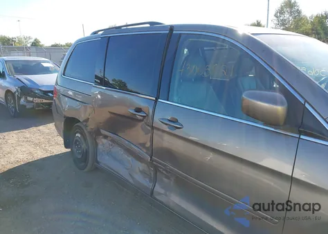 2010 Honda Odyssey Ex-L z USA, uszkodzony, nr VIN 5FNRL3H7XAB069685